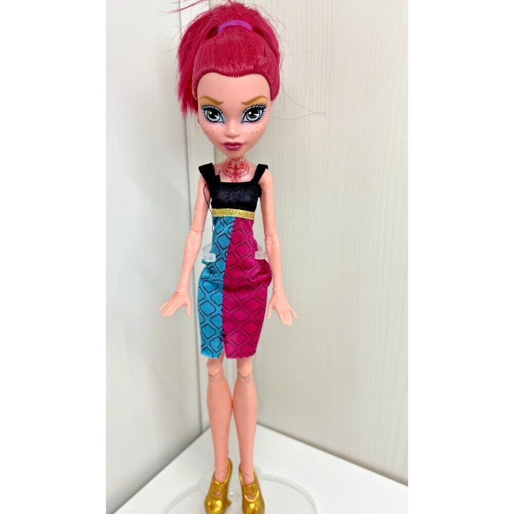 Mattel Doll with Pink Hair and Colorful Dress